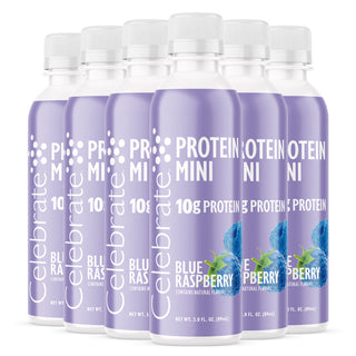 Multiple bottles of Protein Mini Blue Raspberry flavor on a white background